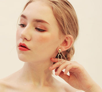 The Art of Minimalist Statement: Why These Hammered Hoops are a Must-Have